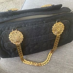 Black bag with gold chain
